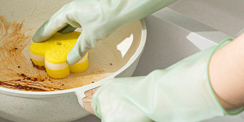 Long green latex cleaning gloves