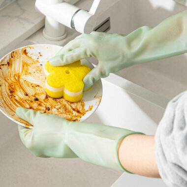 Long green latex cleaning gloves