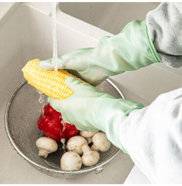 Long green latex cleaning gloves